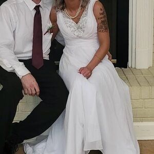 Wedding dress white size 2 and a formal dress white that is size small.